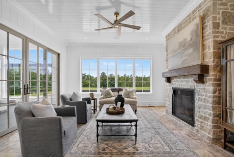 Custom primary sitting room by Wolfe Homes