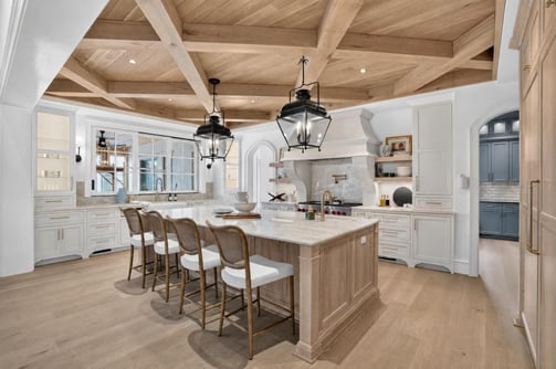 Custom exposed wood ceiling kitchen by Wolfe Homes