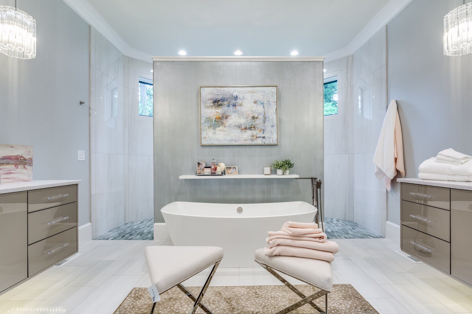 Luxurious custom bathroom in Greensboro, NC designed by Wolfe Homes with freestanding tub and modern decor