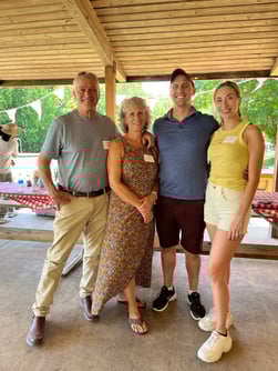 Jim and Alex Wolfe with their wives