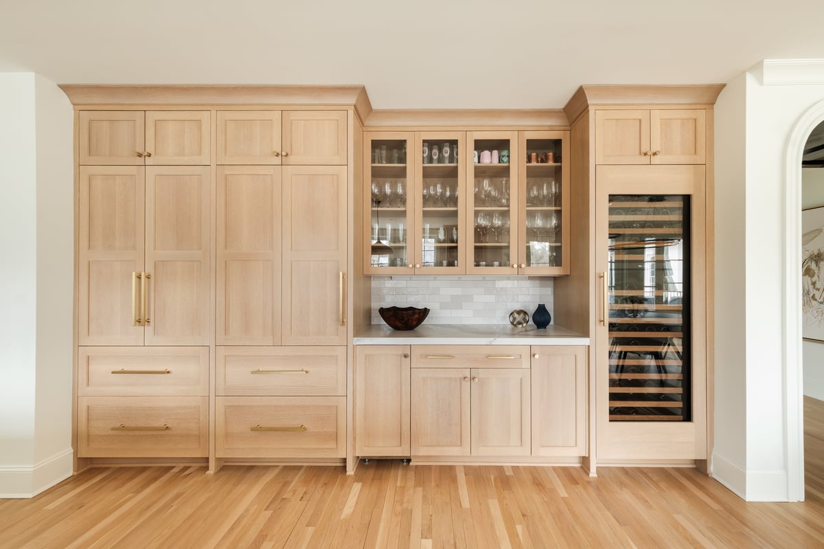 Remodeled kitchen with light wood custom cabinetry in High Point, NC by Wolfe Homes