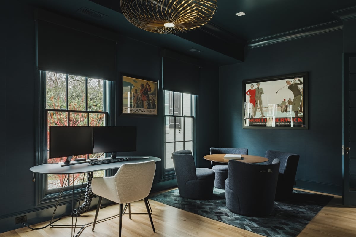 Remodeled modern home office in High Point, NC by Wolfe Homes