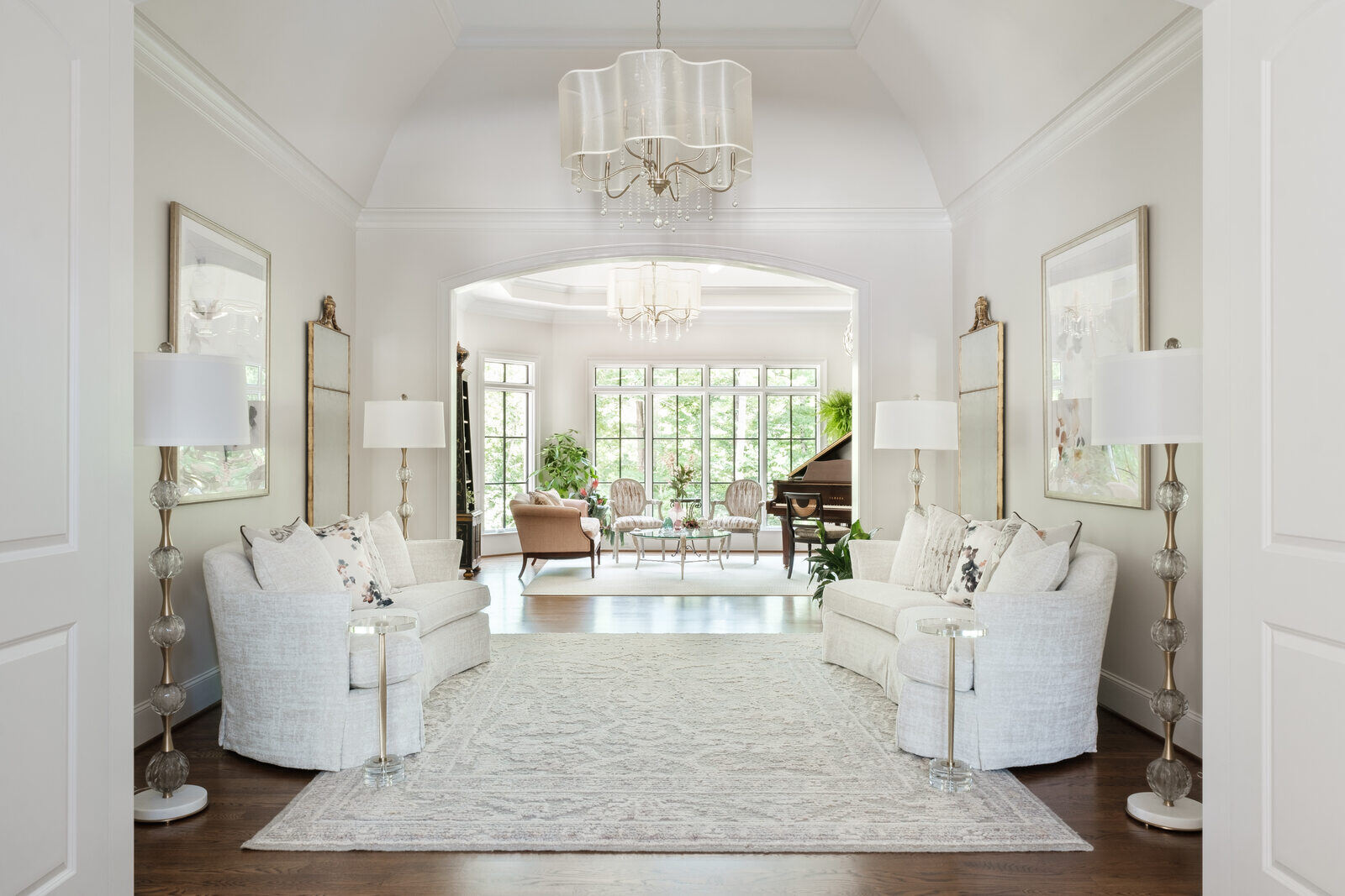 Formal sitting room with plush seating in a custom Greensboro home by Wolfe Homes