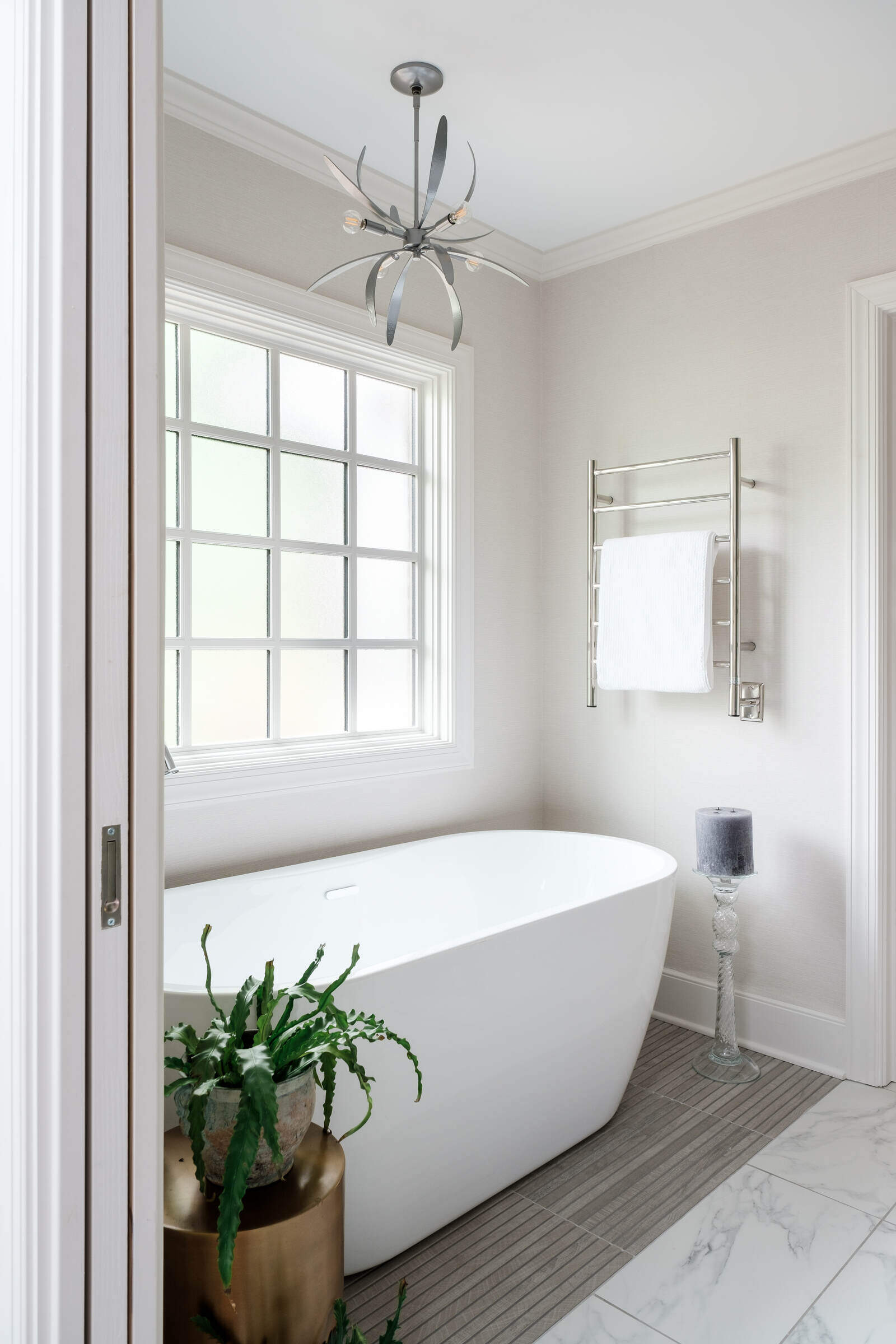 Contemporary bathroom with a freestanding tub in a Greensboro remodel by Wolfe Homes