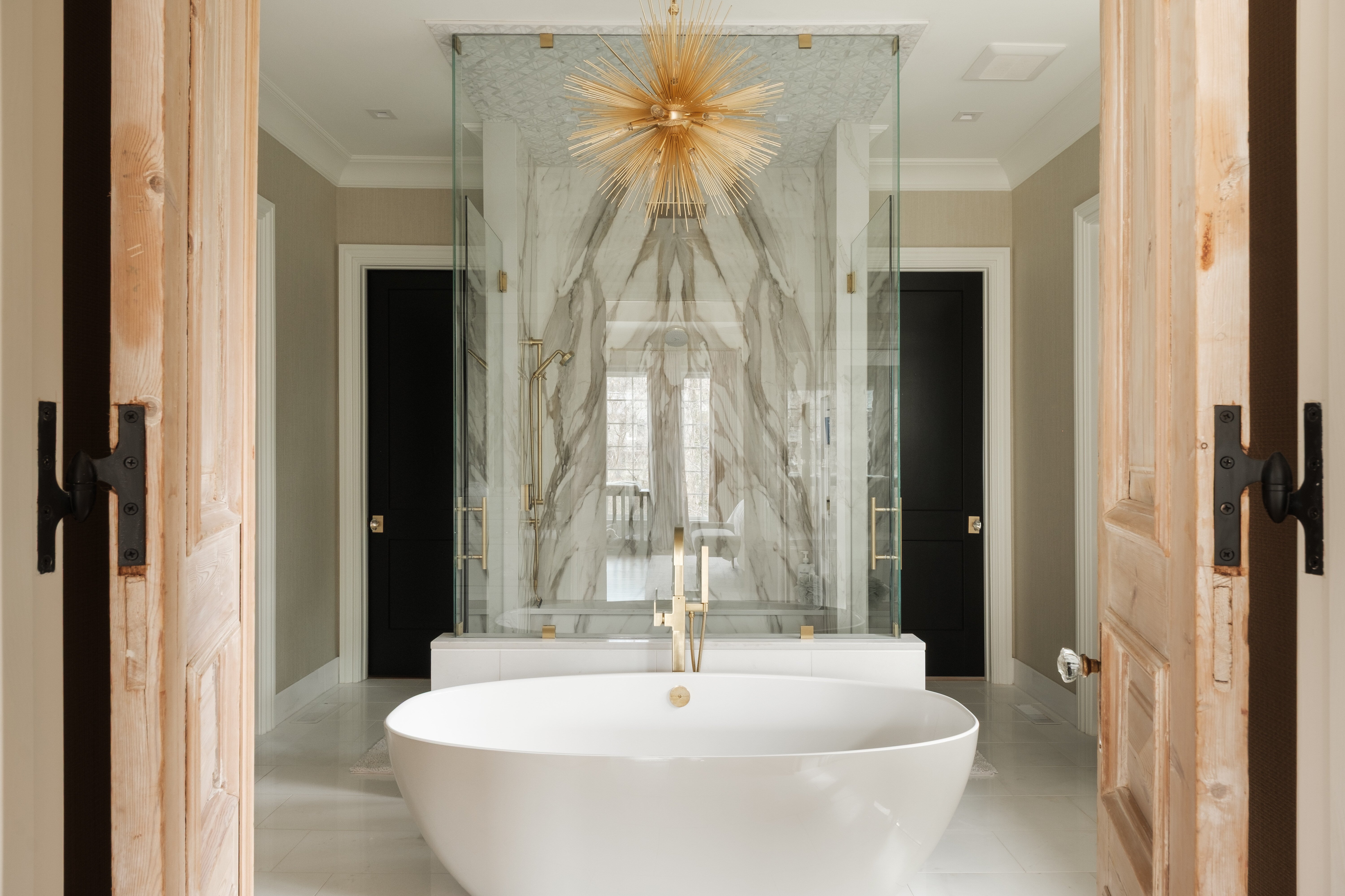 Modern luxury primary bath in High Point, NC by Wolfe Homes