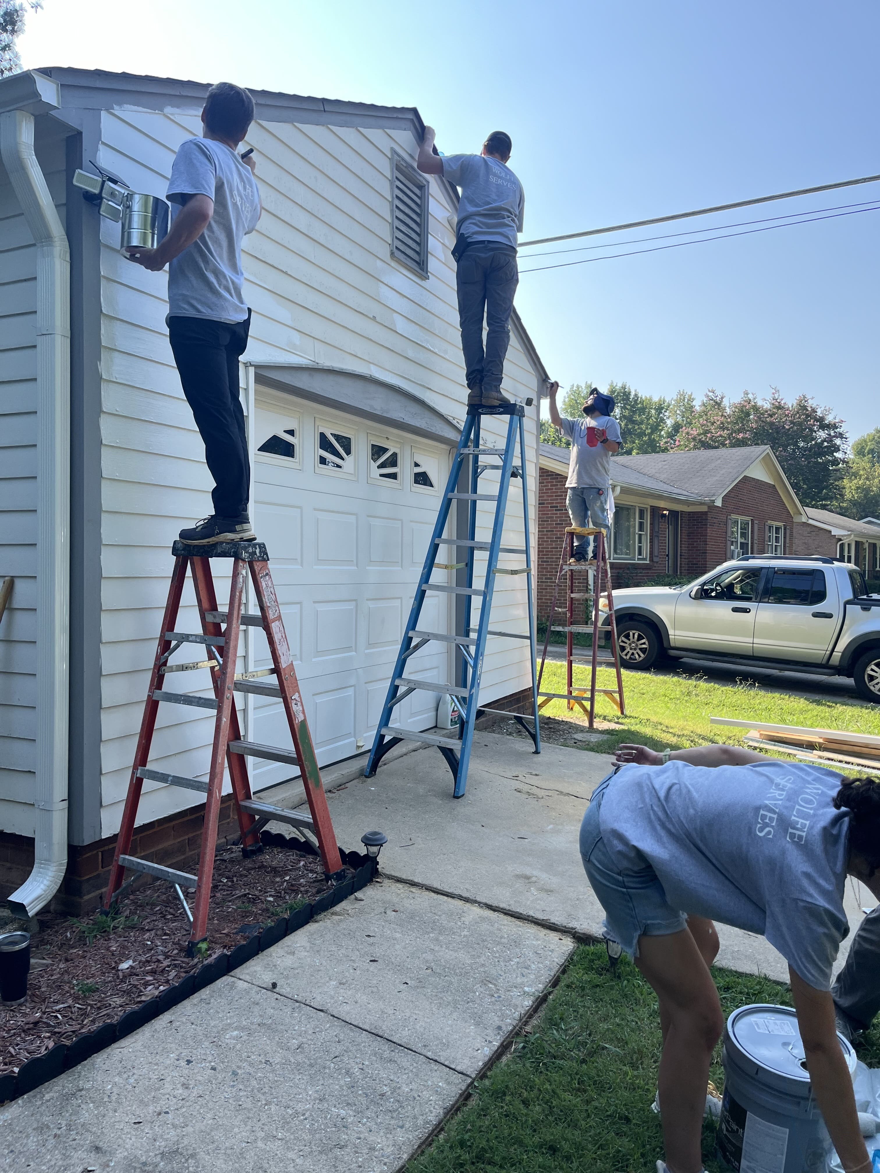 Wolfe Serves_team making exterior improvements to a home