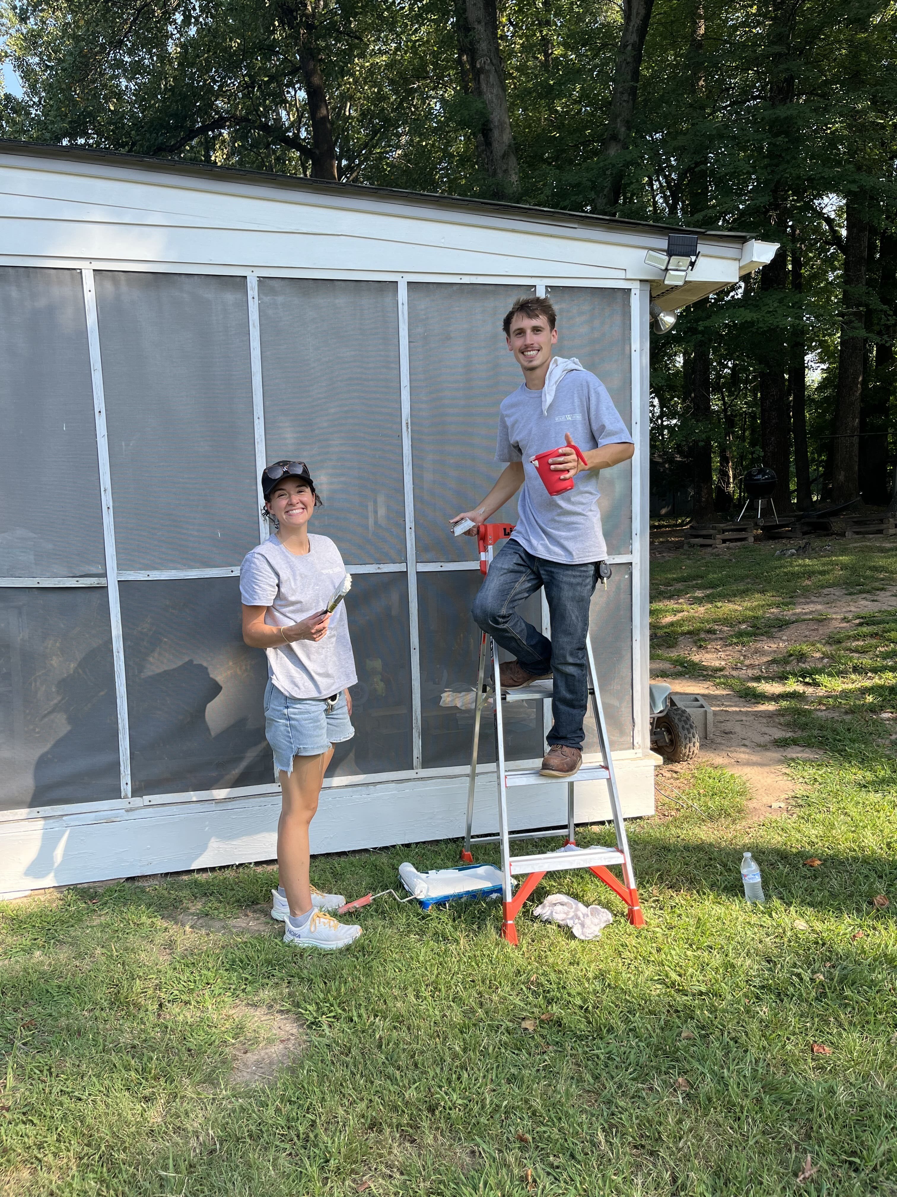 Wolfe Serves_team making improvements to a screened in area of a home